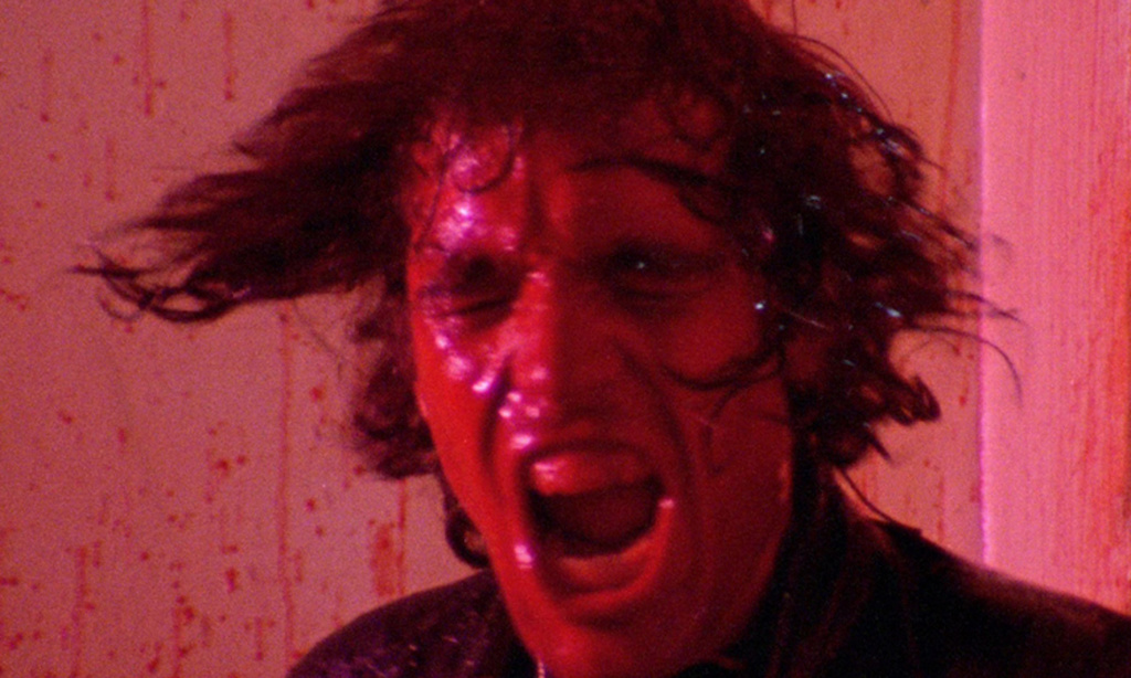 Abel Ferrara playing Reno Miller drenched in blood from the movie The Driller Killer